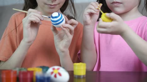 Easter-holiday.-Children-paint-eggs.