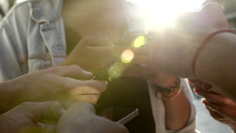 Closeup-shot-of-hands-using-smartphones.