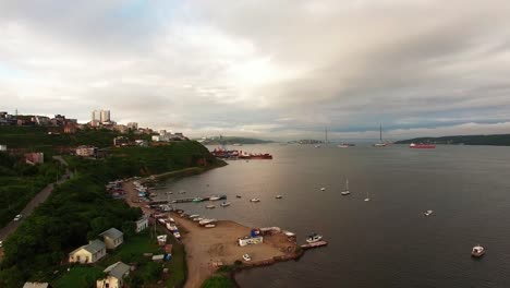 Aerial-view-of-the-cityscape-overlooking-the-Egersheld-district.-Seascape-with-boats-and-the-city.-Vladivostok,-Russia