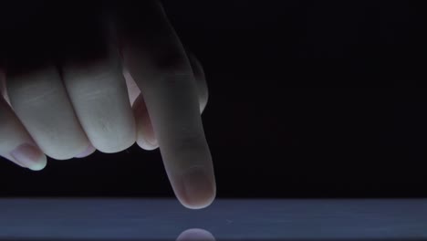 closeup-finger-touching-tablet-computer-touchscreen