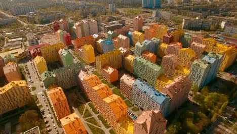 Flying-over-cozy-comfortable-colorful-buildings-in-a-European-city-4K-UHD-aerial