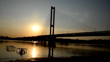 River-and-bridge.Most-at-sunset