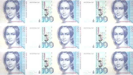 Banknotes-of-one-hundred-german-marks-of-the-West-Germany-rolling,-cash-money