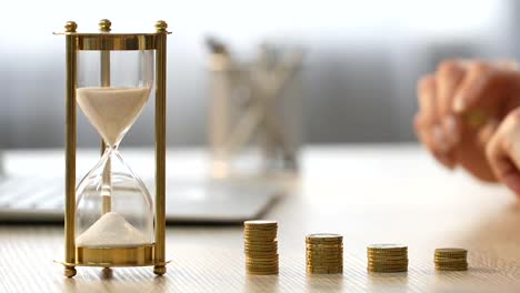 Time-is-money.-Female-in-suit-putting-coin-on-the-table,-lady-working-at-office