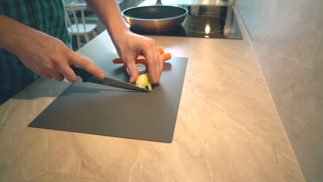 Father-is-cooking-dinner-for-his-children-in-the-home-kitchen