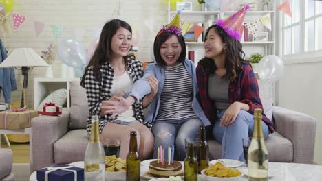 happy-ladies-with-funny-hats-enjoying