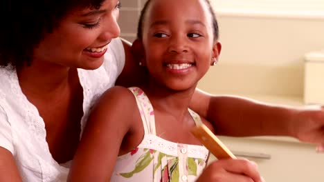 Child-with-her-mother-cooking