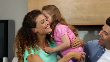 Little-girl-giving-a-gift-to-her-mother