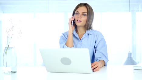 Woman-Talking-on-Phone-at-Work-with-Customer,-Business-Deal