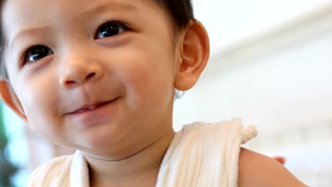 cute-child-baby-toddler-smile-standing-happy-cheerful-in-living-room