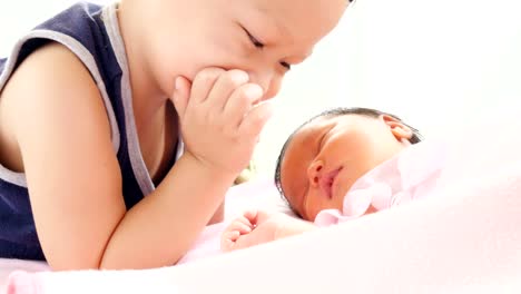 nice-brother-playing-with-mum-and-his-baby-girl-in-cradle-with-tenderness.-concept-of-happy-house-in-snugness.-healthcare-comfortable-childhood