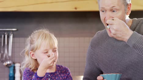 Daughter-and-father-having-breakfast-4k