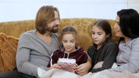 Family-reads-the-book-together