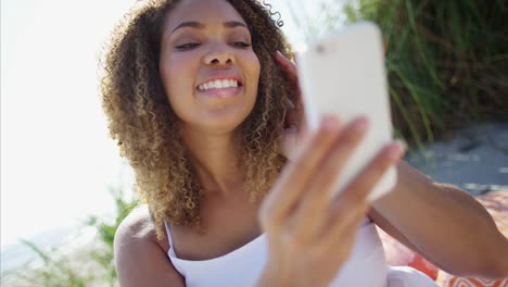 Plus-size-African-American-female-using-smart-phone