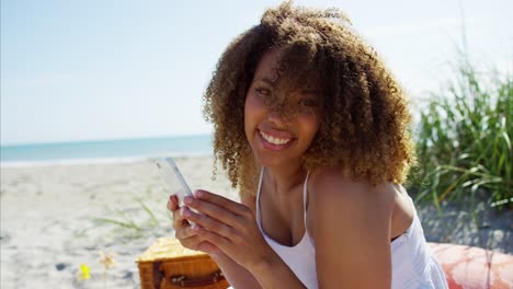 Plus-size-Ethnic-female-picnic-in-sand-dunes