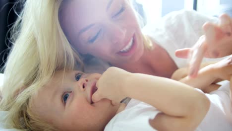 Caucasian-mother-with-her-baby-boy-at-home