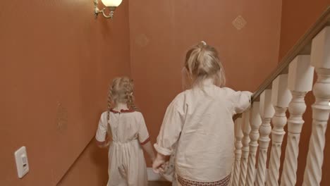 Little-Children-Walking-Down-Staircase