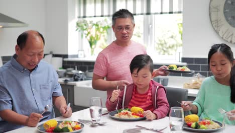 Family-Enjoying-a-Stir-Fry-at-Home