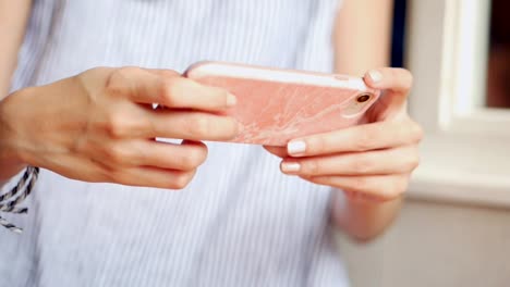 Close-up-young-asian-woman-take-a-photo-pancake-at-cafe.-Technology-and-social-networks-concept.