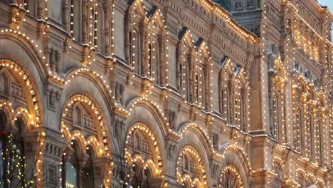 Golden-illumination-of-the-building,-on-the-square.-New-Year's-Square.-Red-Square-in-Moscow