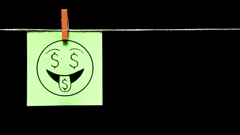 Two-stickers.-Emotions.-On-the-green-sheet-on-the-face-expression-love-of-money.-On-the-right-yellow-page-is-the-percent-symbol.-Black-background.