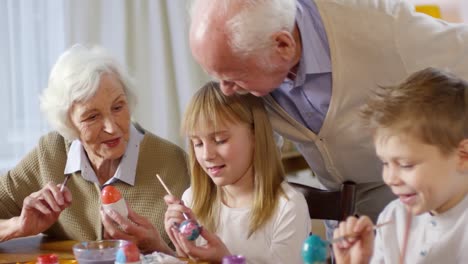 Grandchildren-and-Grandparents-Painting-Easter-Eggs