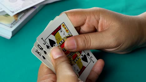 Gambler-showing-good-card-combination,-one-pair-of-aces