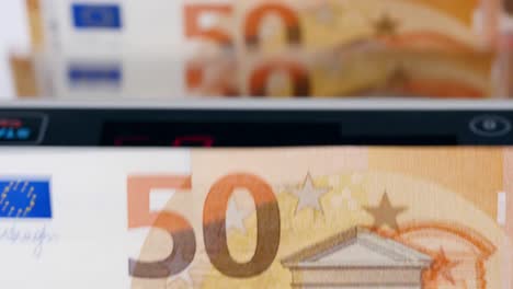 Electronic-counting-machine-works-with-printed-euros.