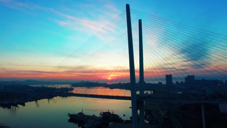 Aerial-view-of-Golden-horn-Bay-and-Golden-bridge-at-sunset.-Vladivostok,-Russia