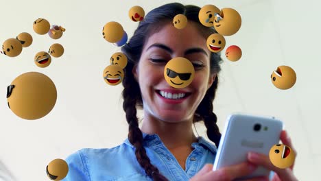 Emoji-Symbole-mit-einer-Frau-mit-Smartphone-im-Hintergrund-4k