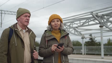 Two-Seniors-on-Train-Station