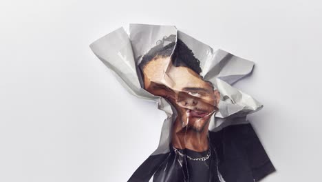 Mental-Health-Concept-With-Picture-Of-Man-Being-Unfolded-And-Then-Screwed-Up-With-Stop-Motion