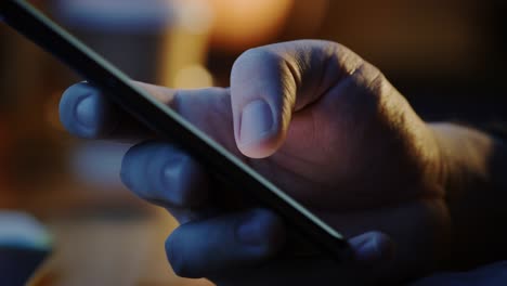 Person-Holding-Touch-Screen-Smartphone-Device-and-Typing-Message.-Concept-of-Email-Writing,-Chatting-in-Social-Media-Apps,-Sending-an-SMS,-Taking-Note.-Close-up-Macro-Side-View