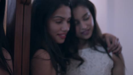 Young-Indian-female-couple-getting-ready-for-a-party