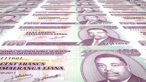 Banknotes-of-one-hundred-burundian-francs-of-Burundi,-cash-money,-loop