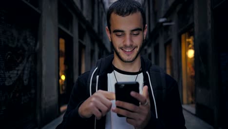 Handsome-man-with-smartphone