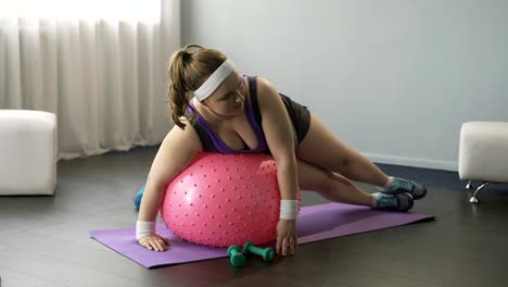 Chubby-girl-losing-balance-and-falling-down,-clumsy-obese-woman-exercising