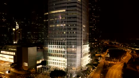 Top-view-of-the-skyscrapers-in-the-big-city-at-night.-Stock.-Great-view-of-the-city-at-night