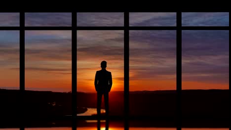 The-male-standing-near-panoramic-windows-on-the-sunset-background.-time-lapse