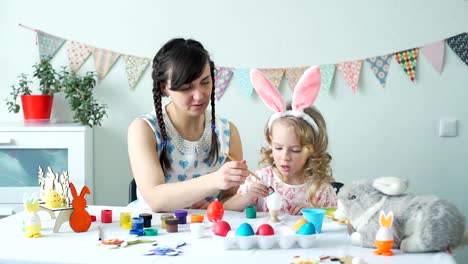 Mother-and-Child-Painting-Easter-Egg-Together