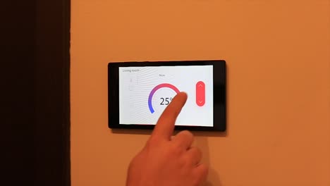 Smart-home-climate-control-device-on-a-wall