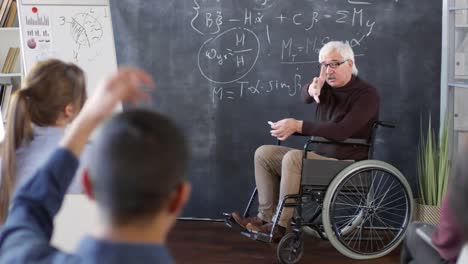 Disabled-Teacher-Speaking-to-Diverse-Students