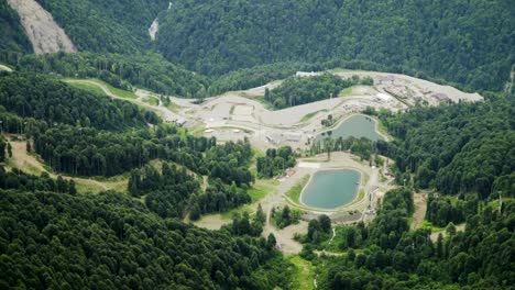 Aerial-view-of-mountain-lakes-in-ski-resort.-Beautiful-mountains-in-summer