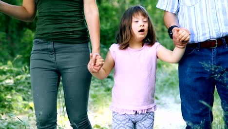 Portrait-of-young-girl-with-down-syndrome