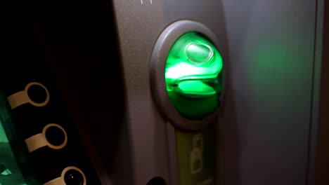 Cash-machine---blinking-green-signal.