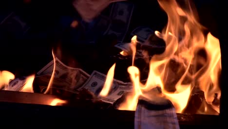 burning-one-hundred-dollar-bill-slow-motion