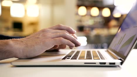 Business-man-working-over-computer-office-typing-fingers-hand-on-laptop-keyboard