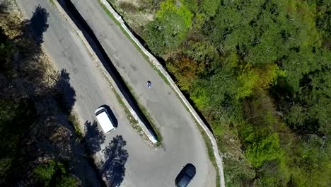 Disabled-Man-On-A-Mountain-Serpentine-Road