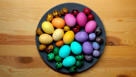 Festive-easter-eggs-laid-on-a-gray-plate