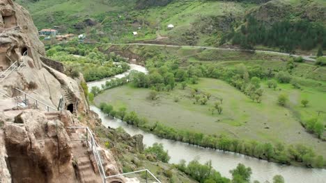 Vardzia-cave-monastery.-Complex-carved-in-rock.-Cave-town-in-the-mountains.-View-from-the-mountain-to-the-river-Kura-Mtkvari